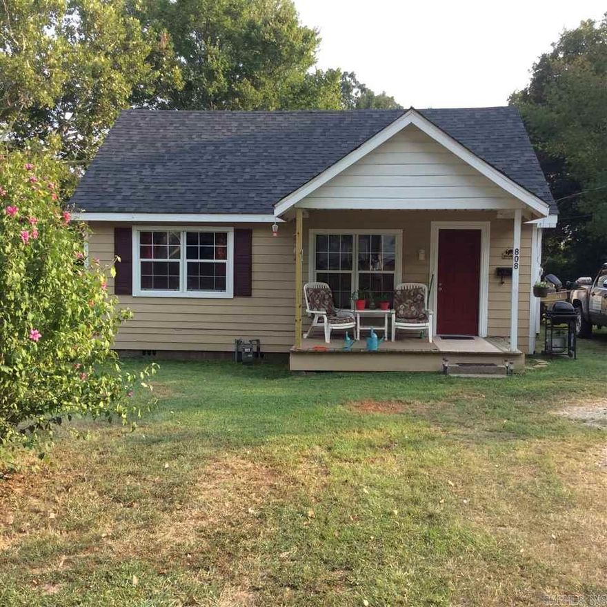 Updated and adorable! This 2bd/1bath home rests on nearly an acre and features wood floors, ship-lap walls and wood ceilings. New kitchen cabinets and counters. New fixtures, roof, insulation, water heater, Heat/air unit, windows, exterior paint and shutters. Refrigerator conveys! Must see!! Agents see remarks