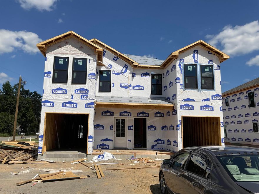 Look at these beauties! All brick/stone NEW CONSTRUCTION DUPLEXES in the heart of Jacksonville! Each unit is 3bed/2 1/2 bath! One car garage opens into the downstairs living space with a half bath for convenience. Upstairs contains primary bedroom at the back with its own bathroom and walk-in closet, as well as two additional bedrooms with a bathroom in-between. Hall laundry makes for the ultimate in convenience! Luxury vinyl throughout will make this renter-ready! This building has a twin going up next door. See 215 & 217 N Elm to see an example of the inside finishes!