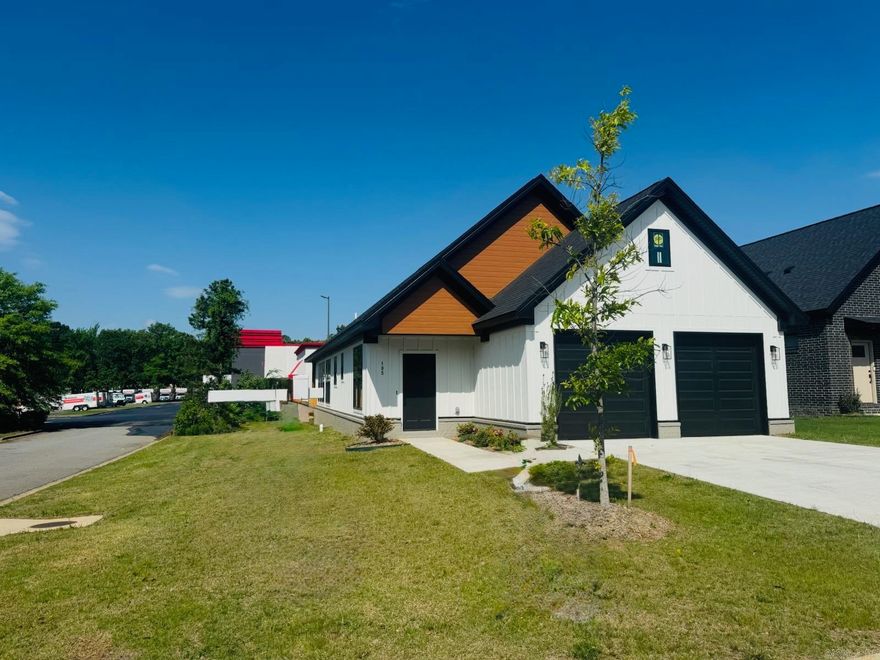 Beautiful patio-style home on a desirable corner lot in the Village of Maumelle. This single-level floor plan offers an open-concept layout with tall ceilings and abundant natural light, creating a bright and inviting living space. The kitchen flows seamlessly into the living and dining areas, ideal for everyday living and entertaining.  The primary suite features a tray ceiling, en-suite bath with soaking tub, separate shower, dual vanities, and a spacious walk-in closet with convenient access to the laundry area. Additional spaces include a guest bedroom, a versatile office or flex room with a closet, and a half bath.  Features include energy-efficient windows and doors, tankless water heater, and quality finishes throughout. Exterior highlights include brick construction, guttering, partial fencing, and a two-car garage with additional parking.  Conveniently located near local amenities, trails, and recreation. Schedule your showing today!