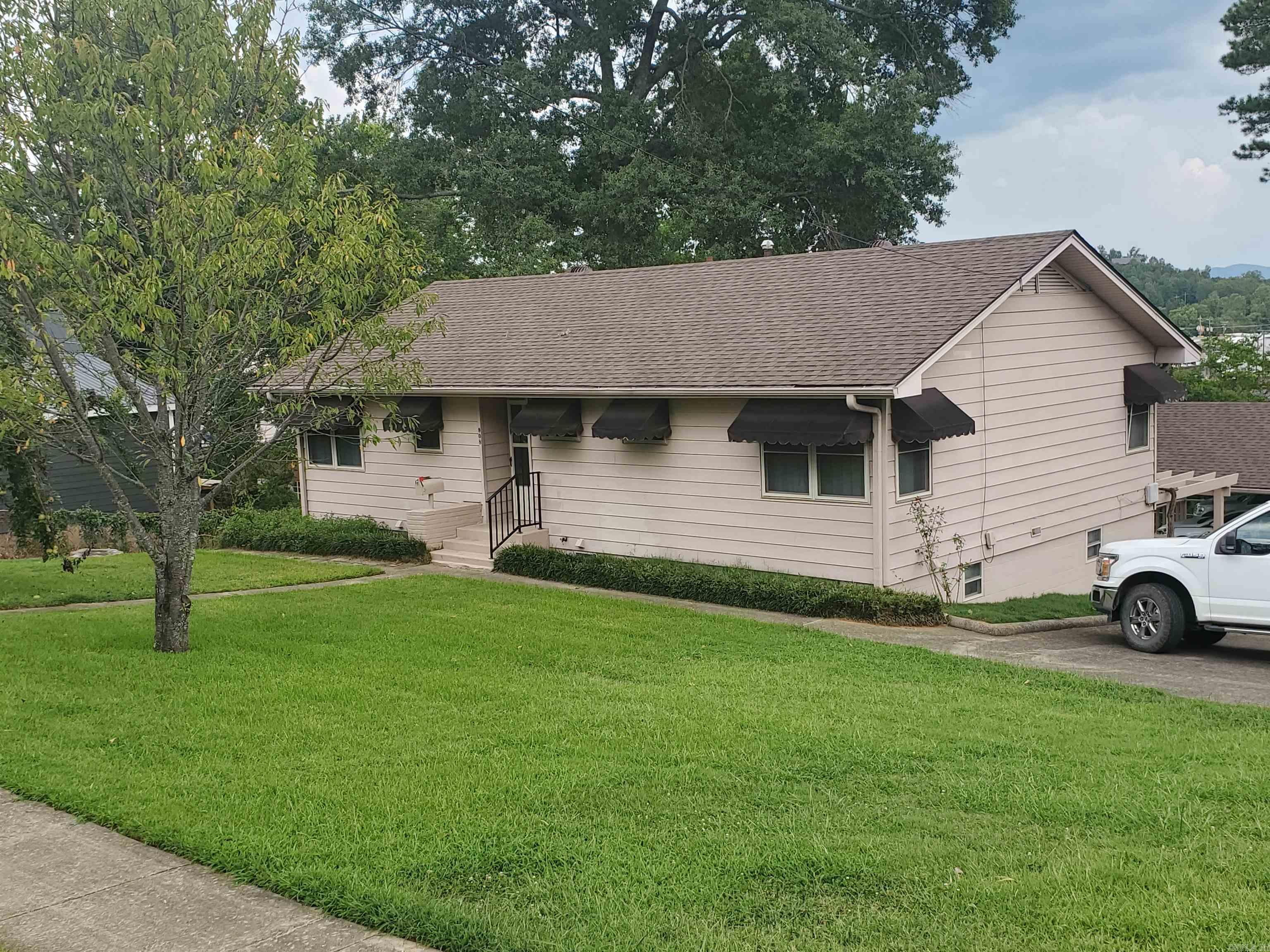Very nice 2 story home on a corner lot. Could be 2 apartments. 2 bedrooms/bath upstairs, 1 bedroom 1 bath down stairs. Double carport. 12 x 20 shop. New roof.
