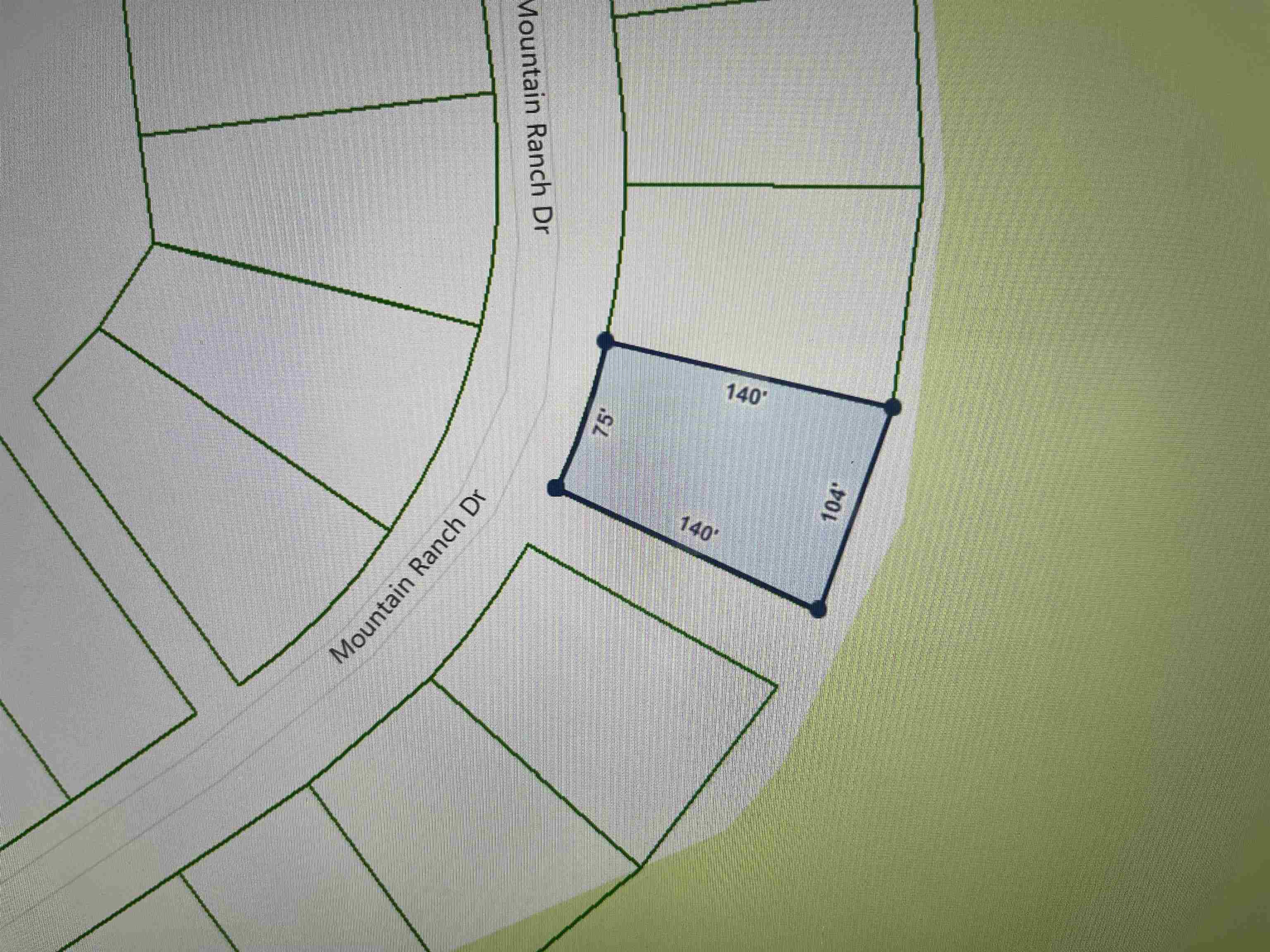 Come build your dream home today on the golf course frontage lot. Enjoy living in Fairfield Bay, where every day feels like a vacation! Nestled amidst the picturesque landscapes of the Mountain Ranch Golf Course, this area offers you the perfect blend of relaxation & adventure. With this prime location, you can indulge in your passion for golf anytime you desire. Tee off during the day & as the sun sets, bask in the breathtaking views of the shimmering lake nearby. This is the epitome of tranquil living at its finest. But that's not all! Fairfield Bay boasts a plethora of amenities to enrich your life. Within minutes of your new abode, you'll find a full-service marina, beckoning you to embark on aquatic adventures whenever the mood strikes. Dive into the refreshing waters of one of the three swimming pools, or challenge your friends to a game of tennis or pickleball. Feel the thrill of exploration as you traverse the hiking & biking trails, or opt for a leisurely round of miniature golf or disc golf. With over 80 miles of UTV trails at your disposal, the possibilities for outdoor recreation are endless. Buyer to pay all closing costs and title insurance.