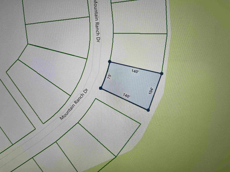 Come build your dream home today on the golf course frontage lot. Enjoy living in Fairfield Bay, where every day feels like a vacation! Nestled amidst the picturesque landscapes of the Mountain Ranch Golf Course, this area offers you the perfect blend of relaxation & adventure.  With this prime location, you can indulge in your passion for golf anytime you desire. Tee off during the day & as the sun sets, bask in the breathtaking views of the shimmering lake nearby. This is the epitome of tranquil living at its finest. But that's not all! Fairfield Bay boasts a plethora of amenities to enrich your life. Within minutes of your new abode, you'll find a full-service marina, beckoning you to embark on aquatic adventures whenever the mood strikes. Dive into the refreshing waters of one of the three swimming pools, or challenge your friends to a game of tennis or pickleball. Feel the thrill of exploration as you traverse the hiking & biking trails, or opt for a leisurely round of miniature golf or disc golf. With over 80 miles of UTV trails at your disposal, the possibilities for outdoor recreation are endless.  Buyer to pay all closing costs and title insurance.