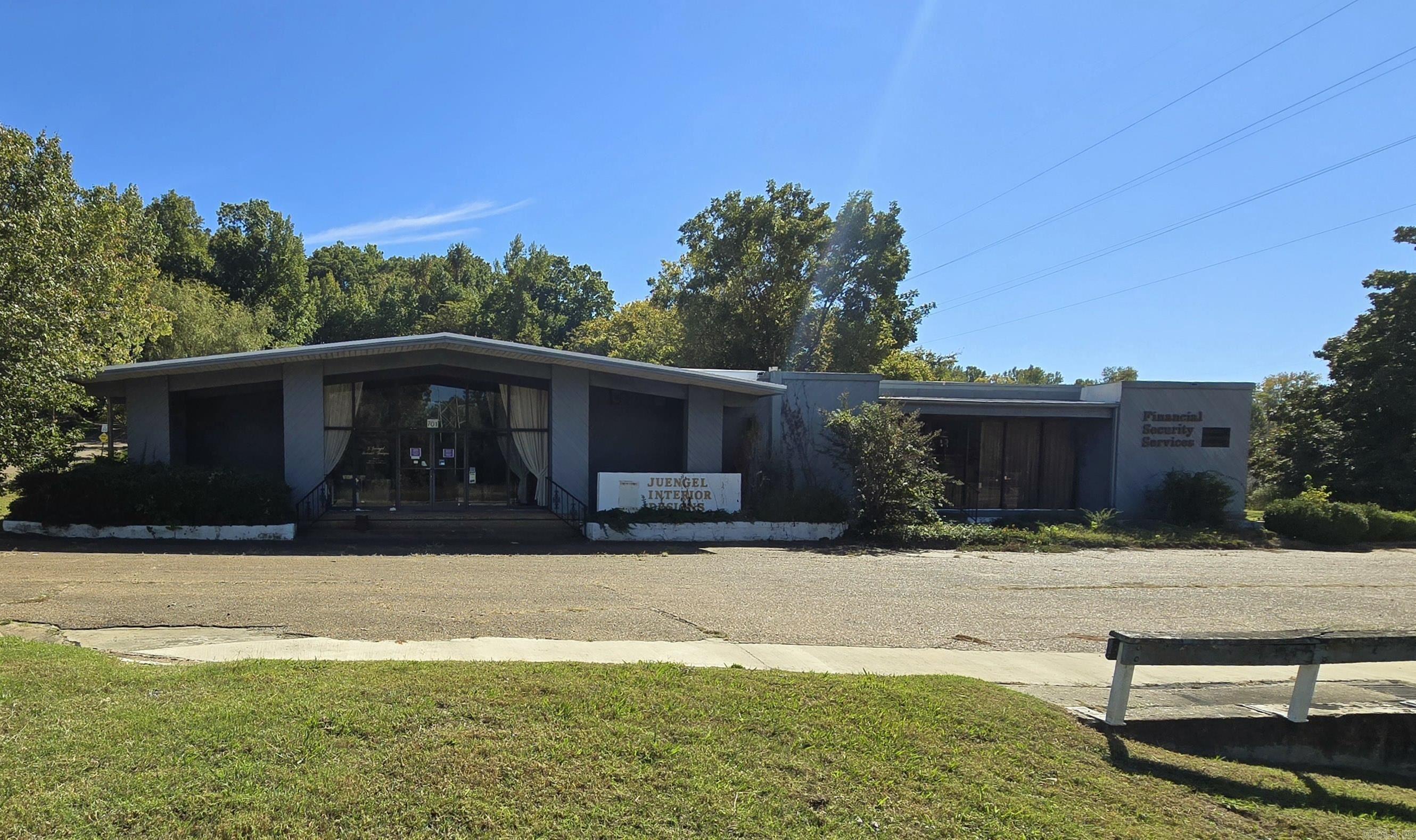 Large commercial property with many options! Located on a busy Highway in central location! Over 6000 sq ft building situated on over an acre was used as retail and office space. Approximately half of the space is open floor that was used as retail and the other half was used as office space and contains several offices and conference rooms. Has a new roof that was just replaced this year. Approx 900 sq ft warehouse storage located at the back of the property is included.