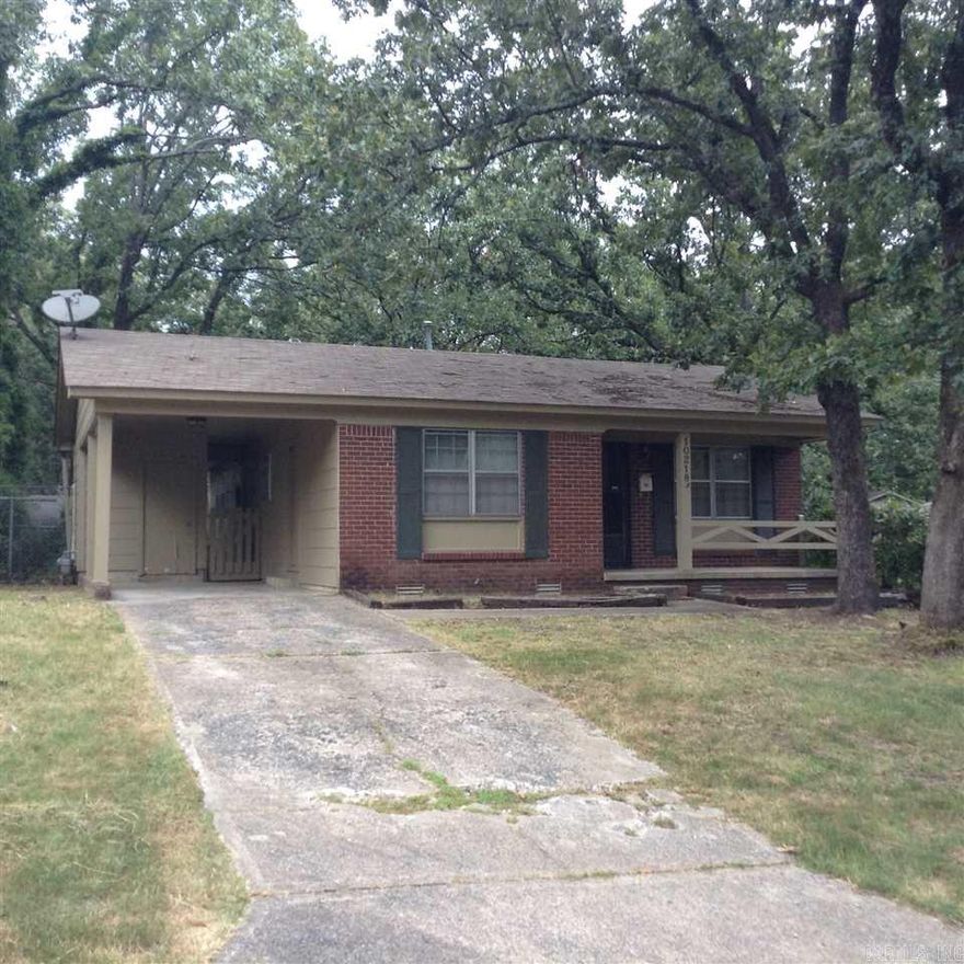 Great Starter home on quiet dead end street. All hardwood, new title in kitchen and dining room. Roof is approximately 5 years old.  Sewer line to street has been replaced. Three bedrooms, one and half baths- both with tile floors-.  One carport and fully fenced backyard. All conveniently located in the heart of Little Rock. Come See!!