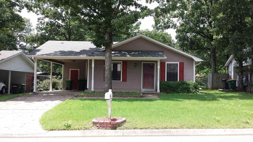 Great location! Great price! Move in ready! This 3 BR/1.5 BA has open floor plan with eat-in kitchen & den that has gas-starter fp & built-ins.  Large laundry with shelves, ample storage in & out w/ large closets, storage in carport & storage bldg in back yard.  Crown molding in all rooms. Updated fixtures, sinks & cabinets in bathrooms.  Back yard fully fenced w/ privacy fence on 2 sides.  Within walking distance to Harmon Rec & elementary school. Close to police station & city pool. Check it out today!