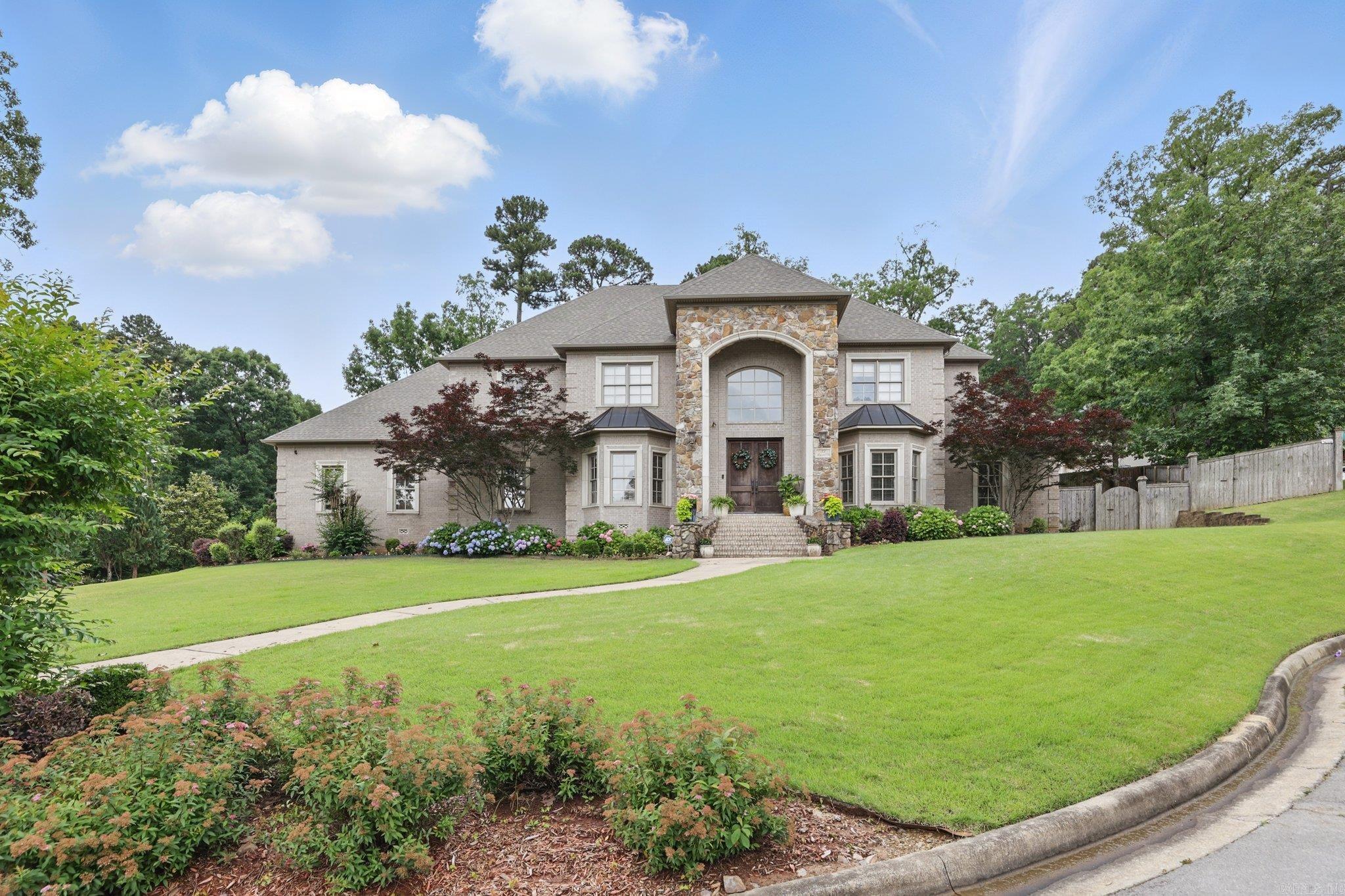 Step into Luxury... The Maisons in Chenal Valley welcomes you to this traditional home that sits on almost a half acre corner lot with professional landscaping and well maintained lawn. This stunning custom home greets you with 20 foot ceilings as you enter the grand foyer entrance. The Primary suite with sitting area on the 1st level offers privacy and one-level living with all the other bedrooms upstairs with en-suite bathrooms and large closets. The 1st floor also boast great entertaining space with open living / dining, the kitchen open to the hearth room and a private office while upstairs also has its own entertainment room with a complete theater system and wet bar. Enjoy the mountain views while conveniently located to shopping & dining. Newer Roof with in a few years, 3 AC units - 2 New and 1 New Condenser, Central Vacuum and Tankless Water heater just to name a few key features. Agents See Agent Remarks !!!