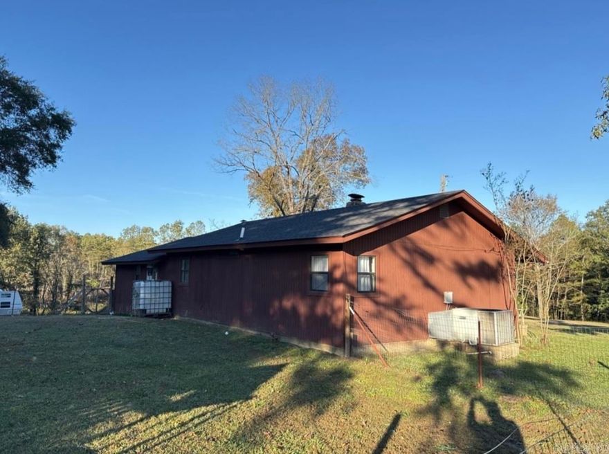 BLUE SKIES AND FRESH AIR ARE CALLING!! This Super Cute 3 bed/2bath Country Home is perfectly positioned on 16 BEAUTIFUL ACRES with a pond and wildlife galore in Caddo Hills School District! Being located just 10 minutes from the Caddo River and less than 10 minutes from thousands of acres of public hunting land, make this property a nature enthusiast's dream place! Whitetail deer and turkey are abundant!! Come warm up around the wood stove! Play with your fur friend in the fenced backyard! Or simply enjoy a home-cooked meal in the cozy kitchen! This home FEELS LIKE HOME!! Got a horse or chickens? Bring them!! WHAT A PERFECT place to raise your family or to simply get out of the rat race! This one won't last! BOOK YOUR SHOWING TODAY!