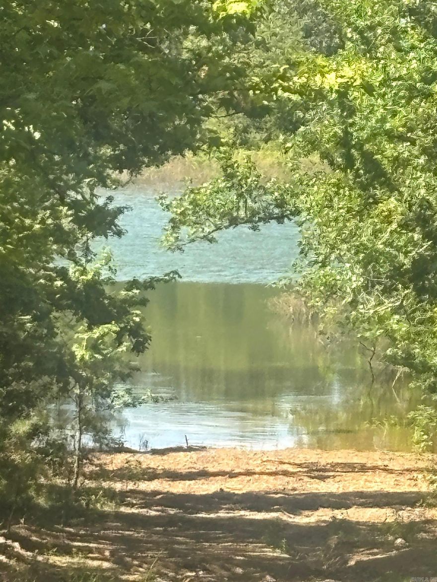 Will subdivide.  $65,000.00 per acre lot or $120,000.00 for both.  Beautiful lot with lake access.  Has electricity and water. It previously had a septic tank. There is a new pole with 200 amp service on it.  A water line was ran from the meter to a spicket in the middle of the lots.  This beautiful water front acreage over looks Greers Ferry Lake.  It is the perfect sight for a lake getaway.