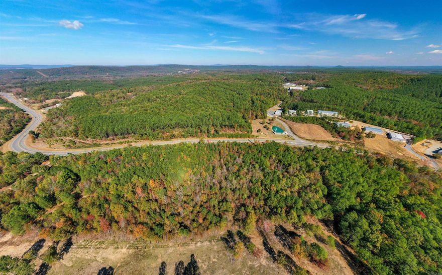 Location. Location. Location. Prime land with Highway 7 frontage just north of the round-about and just south of Walmart! Can be commercial or residential.