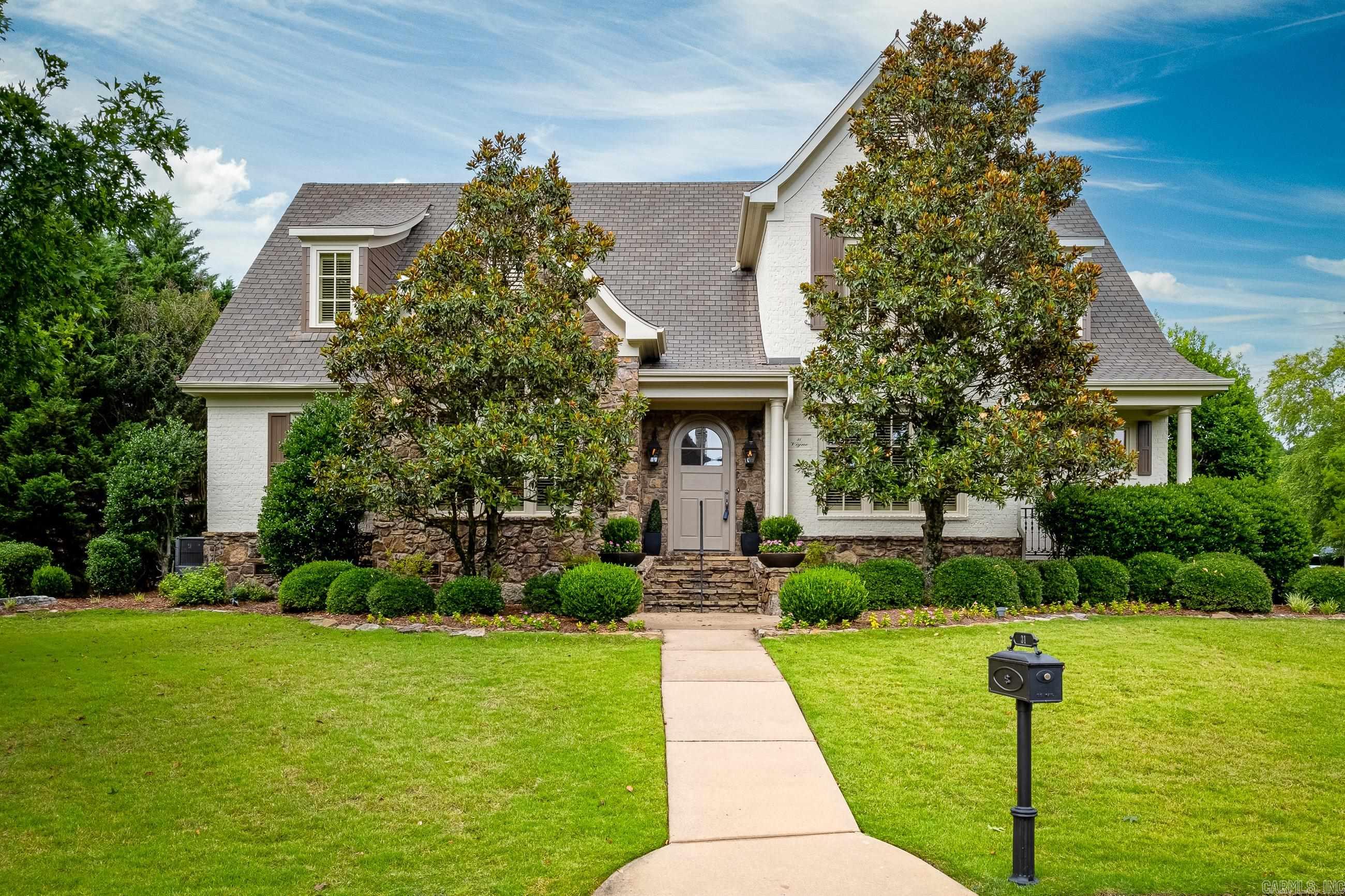 Exquisite features and finishes all throughout this stunning home in The Arbors. Finely crafted mill-work, fabulous decor touches and gorgeous hardwood floors are some of the details that showcase the quality in this beautiful home. Formal and informal living and entertaining spaces, impressive gourmet kitchen with top of the line appliances and plenty of custom cabinetry. Tall ceilings, plantation shutters, huge closets, all granite countertops and luxurious primary and guest suites on main level. Bonus area, playroom with built-ins, family room/den/tv room and third guest suite up. Charming outdoor living spaces with covered and uncovered patios around the in-ground pool. Side load garage with epoxy floors, built in storage cabinets and golf cart storage. Delayed possession needed. Come See!