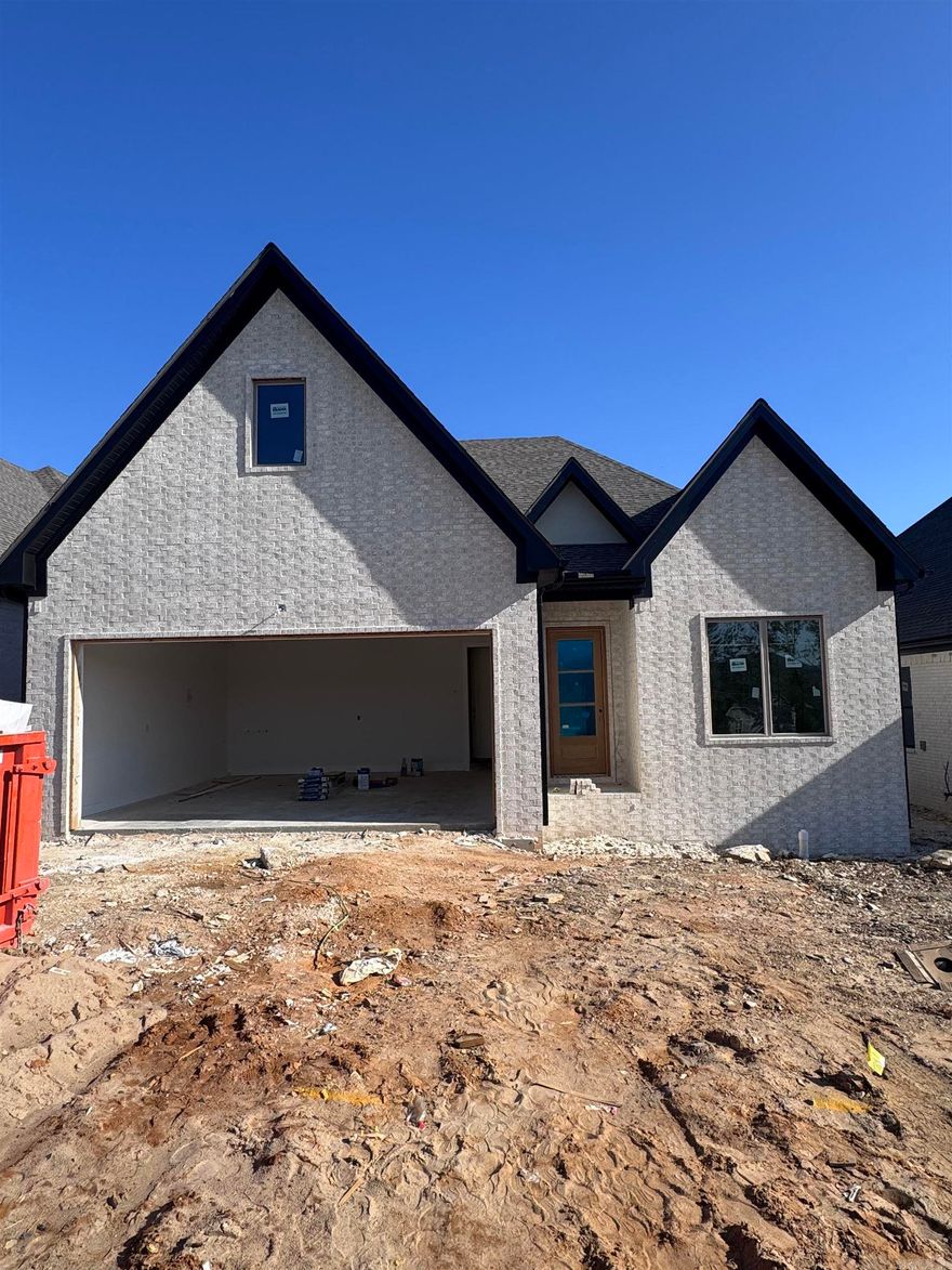 Welcome to Mountain Brook, West Little Rock's newest neighborhood, conveniently located off Highway 10 behind The Ranch. This single-level residence beautifully combines craftsmanship and design, featuring three bedrooms and two baths. The primary suite serves as a sanctuary with a spa-like bath, soaking tub, oversized walk-in shower, and a custom closet. The living room boasts soaring 12' ceilings and a floor-to-ceiling tiled fireplace. At the heart of the home is a chef’s kitchen equipped with quartz countertops, custom cabinetry, a dining area, and a fully functional pantry. You can also enjoy evenings by the outdoor fireplace. The home is scheduled for completion in May 2026. Please contact the listing agent to schedule your private tour.