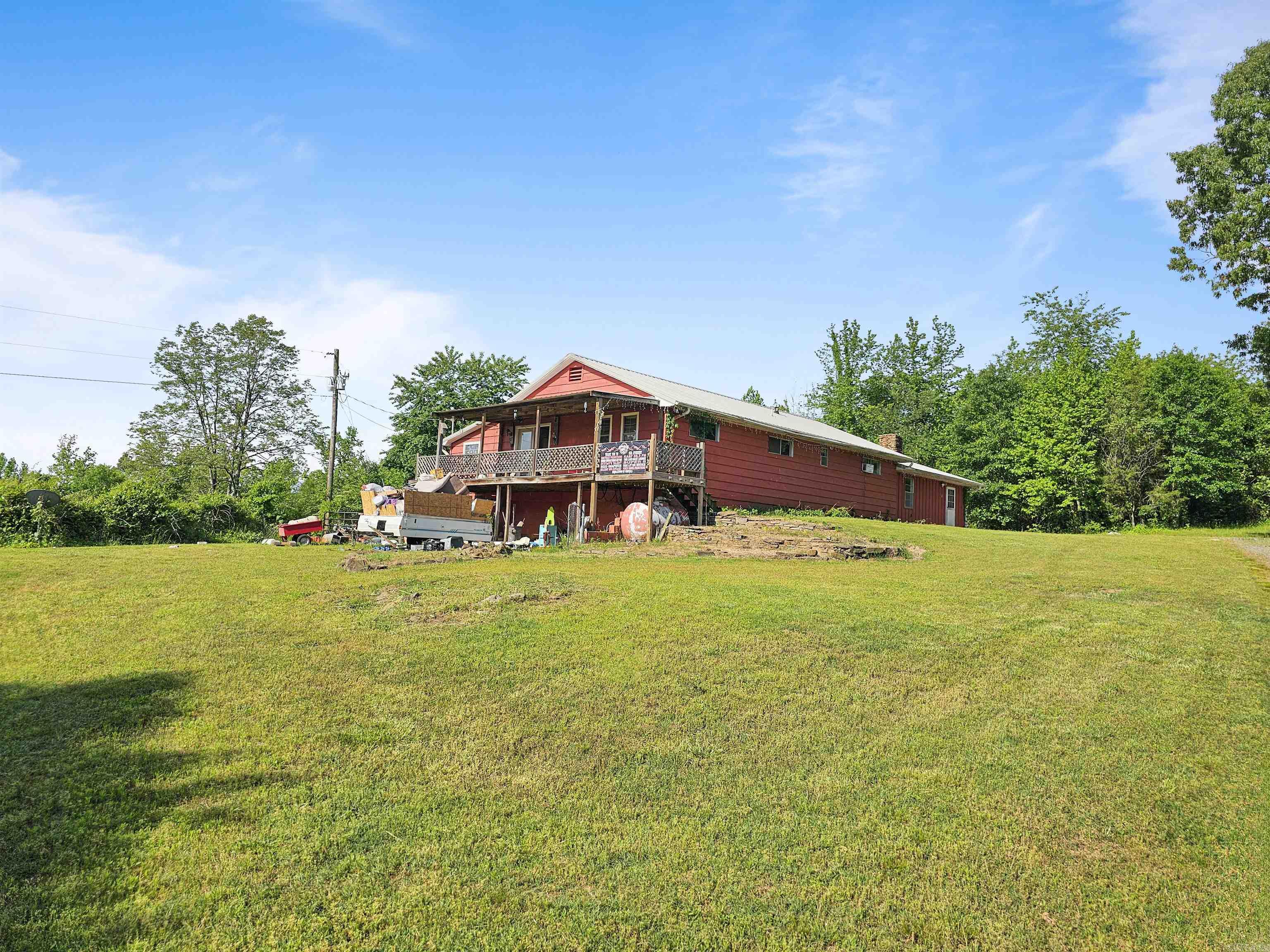 Take a look at this! This large home sits on top of a hill with a vista view and is ready for a new owner. This home features 2 bedroom with 2 living rooms a bonus room and a sun room. Agents see confidential remarks.