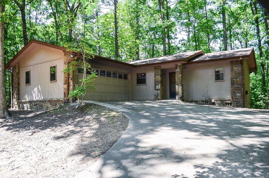 Popular "Villager 2" Cooper floor plan...With a few updates and your special touches this home will be a comfortable spot to call your own. The property features laminate flooring, double garage and private deck adjoining common property woods. The open floor plan highlights split bedrooms and 2 full baths. Kitchen houses pantry and washer/dryer closets. Located close to Lake Cortez. No seller property disclosure is available. Hot Springs Village Property Owner Association has a new member buy-in fee of $2,000.00 due and collected at closing.