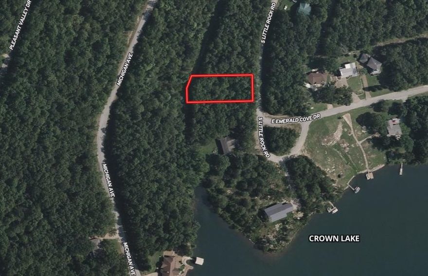 Check out this wooded lot next to Crown Lake! Great location to build your dream home! Needs a state approved percolation test prior to building. There is an annual Parks & Recreation Fee of $80.00 for upkeep of amenities.