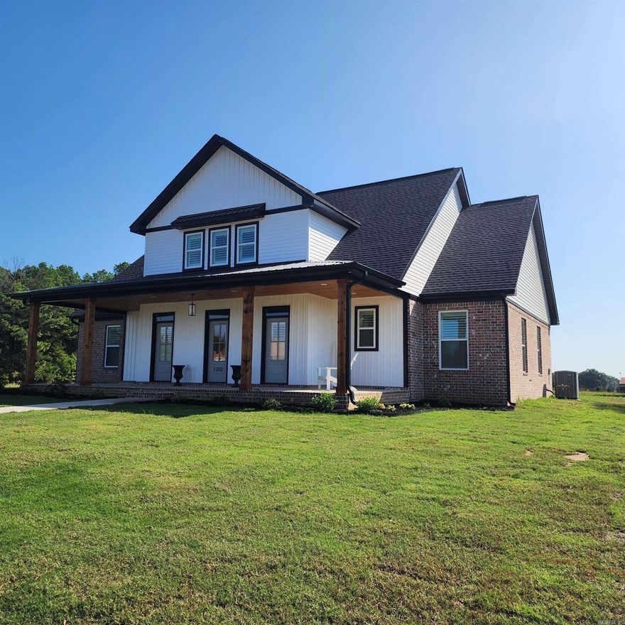 Nice new construction house located in Searcy's newest upscale neighborhood. It is on a corner lot. This house features a bonus room with mini split HVAC upstairs above the garage with storage & closets that could be used as a 4th bedroom, office, game room, etc. Separate laundry, small office, covered porch & back patio. The main bath has a wet room that has both the shower & tub located inside, dual sinks, walk in closet & separate laundry. The ceilings in the living area are 18' tall & 3 doors on the front gives this house a lot of character. Quartz countertops, tile backsplash, gas range, gas tankless water heater, custom cabinets, gas log fireplace, covered patio with wood tongue & groove ceiling for relaxation. Sold before listed.