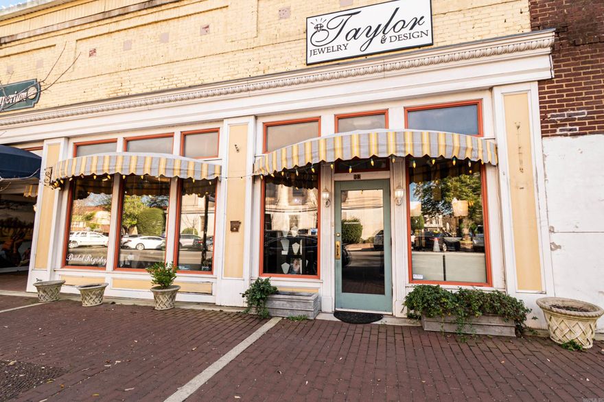 Prime Commercial Property for Sale –  Historic Downtown, "The Plaza"  Located in the heart of the historic downtown area, this exceptional commercial property at 103 E. Main Street offers limitless potential for a wide range of uses. Situated on the square, the building is surrounded by a vibrant and charming downtown atmosphere, making it a prime location for businesses and investors alike. Key Features: • Address: 103 E. Main Street, Historic Downtown Plaza • Building Size: 8,700 square feet • Includes building and land (businesses are not for sale, only the property) • Location: Located on the historic downtown square, offering high visibility and foot traffic. Property Highlights: • The property consists of multiple buildings, with two of the buildings currently leased. This provides immediate rental income while offering flexibility for future plans. • The entire upper floor is available for potential redevelopment – convert it into residential apartments or create a custom space for a business, expanding the building's functionality.