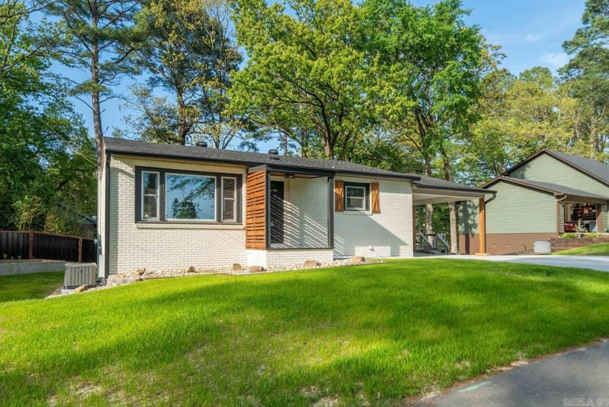 This beautifully remodeled 3-bedroom, 2-bathroom home offers 1,960± sq ft of thoughtfully updated living space, combining modern comfort with serene waterfront views and 55 feet of lakefront. Located in a cove on Lake Hamilton, every inch of this home has been meticulously renovated to provide a fresh, move-in ready experience. Step inside to discover all-new features, including a brand-new roof, fresh interior and exterior paint, and a fully remodeled kitchen and bathrooms with contemporary finishes and fixtures. The open floor plan offers a bright and airy atmosphere, perfect for relaxing or entertaining guests. Enjoy lake life to the fullest with a brand-new boat dock—ideal for boating, fishing, or simply soaking in the views. Conveniently situated near the bypass, you’ll have quick access to shopping, medical facilities, restaurants, and more. Located in the lakefront living and in-town convenience. Owner is the listing agent – Call today for more details and to schedule a private showing