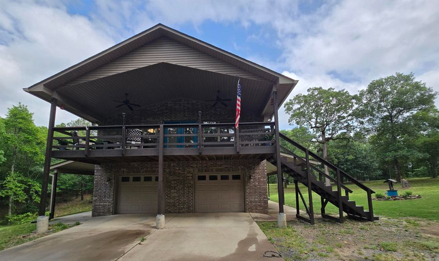 Country Living home where you're gonna love sitting on 1 of the 3 covered porches, enjoying an outside fire with the family, or cozied up with the inside fire place. This home features: Safe room that is also a full bath. Natural light, granite counter tops, Vaulted ceiling, wood burning stove, hard wood floors, Huge oversized 2 car garage with generator hook up you can run your entire home if needed,  lots of privacy on 5.57 acres on wooded and cleared land. New dishwasher and microwave in 2023, Hot water heater in 2021, (shed, washer & dryer, fridge can all stay with the right offer) There use to be an old well on the property that has been capped off.