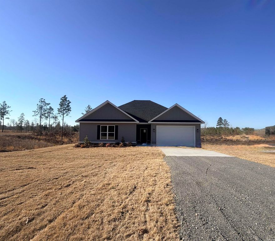 Brand new construction on 1.70 acres in the country! This 1800 sq ft home offers 4 bdrms, 2 baths. Luxury vinyl plank flooring throughout, granite counter tops, and custom cabinets. Plenty of space with benefits of new construction-all in a beautiful rural setting with room to grow.