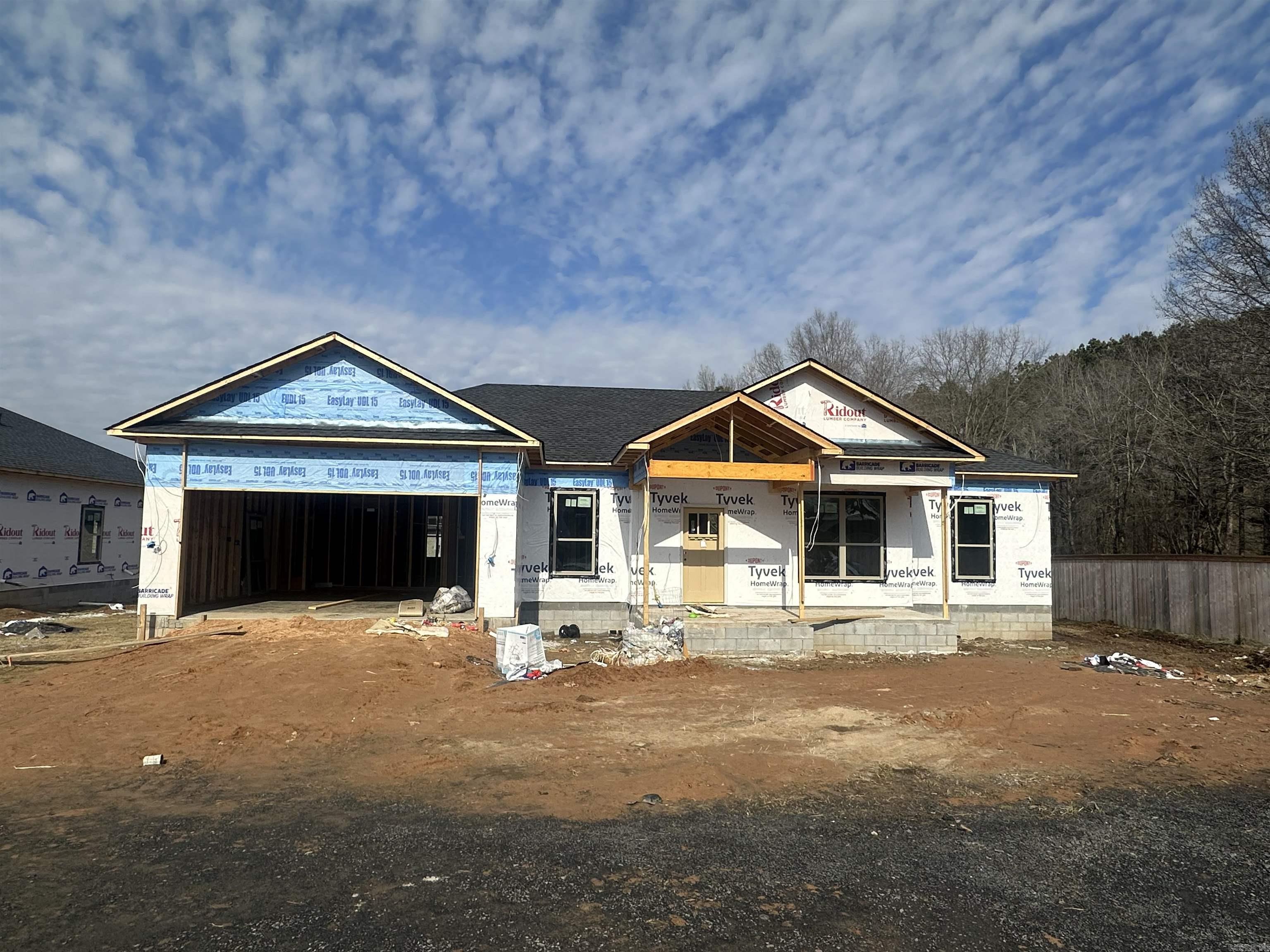Beautiful new construction Patio home close to shopping and restaurants. Welcome to your new home with a covered front porch. Spilt floor plan, large size rooms, kitchen/breakfast area/living room combo. Lots of cabinets, granite countertops, pantry. Separate huge laundry room. Floored attic space. Covered patio, two car garage. This neighborhood is gated. You still have time to pick some items out. *** Finish out on home will be similar to the photos posted *** Pictures shown are of a model home. ***Agents see remarks ***