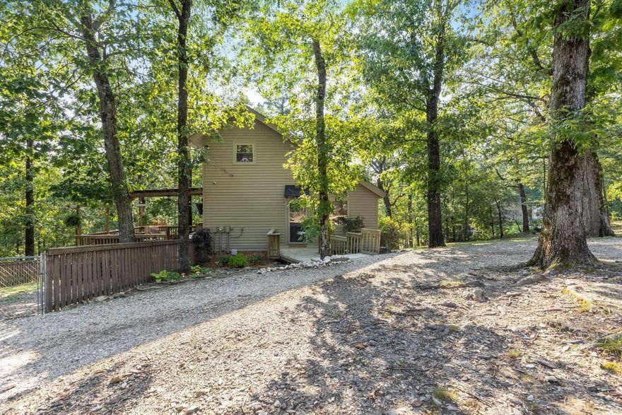 Introducing a private oasis nestled close to all the amenities of West Little Rock. This beautiful property boast 3 BEDRMS & 2 baths, along with a cozy loft for addl. living space or office. On the lower level, you'll find a bonus room adorned with built-ins & storage. The main floor greets you with a light-filled great room, creating a welcoming ambiance. Entertain guests in the updated kitchen with quartz cctops & stainless appliances. Off the kitchen, step outside to the large covered deck, ideal for enjoying the serene surroundings. For those with green thumbs, a greenhouse awaits. Additionally, a charming chicken coop adds to the property unique character. Don't miss this opportunity to own this mid-century modern home combining functionality & aesthetics for contemporary living. Agents see remarks!