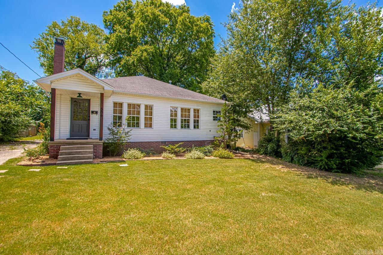 Wow! Looking for something in downtown Benton!! This beautifully updated home has been thoughtfully renovated for modern living but still shows charm! Featuring three inviting bedrooms and two & half modern baths. Very large open living, kitchen & dining area!! You will love all the natural light. Laundry room has a sink!! The fully fenced backyard provides privacy & is perfect for relaxation or entertaining. There is a storage building that could be a playhouse or storage! Come take a look!!