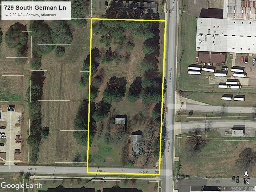 Prime commercial lot for sale in the heart of Conway, Arkansas! This +/- 2.39 acre tract has all Conway Corp utilities available. Current zoning is R-2 for duplex development with the possibility of rezoning to allow for general office uses. Existing structures on property convey at no value.