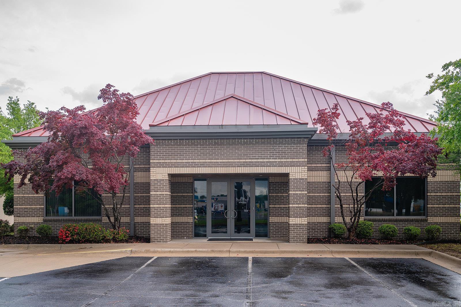 Prime Commercial Opportunity in the Heart of Cabot! Previously home to Bank OZK, this well-maintained building is perfectly suited for a variety of professional uses. Featuring a functional drive-through, multiple teller stations, private offices, a kitchenette, and restrooms, it offers a turnkey setup for financial institutions, medical offices, or business headquarters. Located in a high-traffic area with excellent visibility and accessibility, this property provides convenience for both staff and clients. Don’t miss your chance to invest in one of Cabot’s most desirable commercial locations!