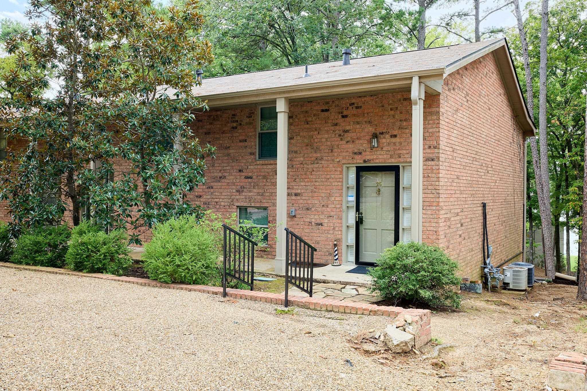 Rare Opportunity in the highly desirable Baywood Colony on Lake Hamilton! This fabulous move- in ready, end unit condo features 2 bedrooms, 2.5 bathrooms, new paint throughout, all new LVP flooring, new windows, new lighting, tankless water heater, granite counter tops with large sink in kitchen, wood burning fireplace with gas starter and a boat slip!