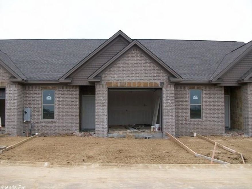 Very open plan with the kitchen dining and living being all 1 open room. Tons of cabinets, nice built in, & lots of crown molding. Seller plans to have wood flooring in the living room, tile in the kitchen, laundry room and bathrooms, and carpet in the bedrooms and to give the buyer allowance for their choice on appliances.  Master bath has 2 seats in walk in shower, nice vanity and storage, &  walk in closet in the master bedroom. Very pretty plan and buyer can help with the color choices if they hurry  !