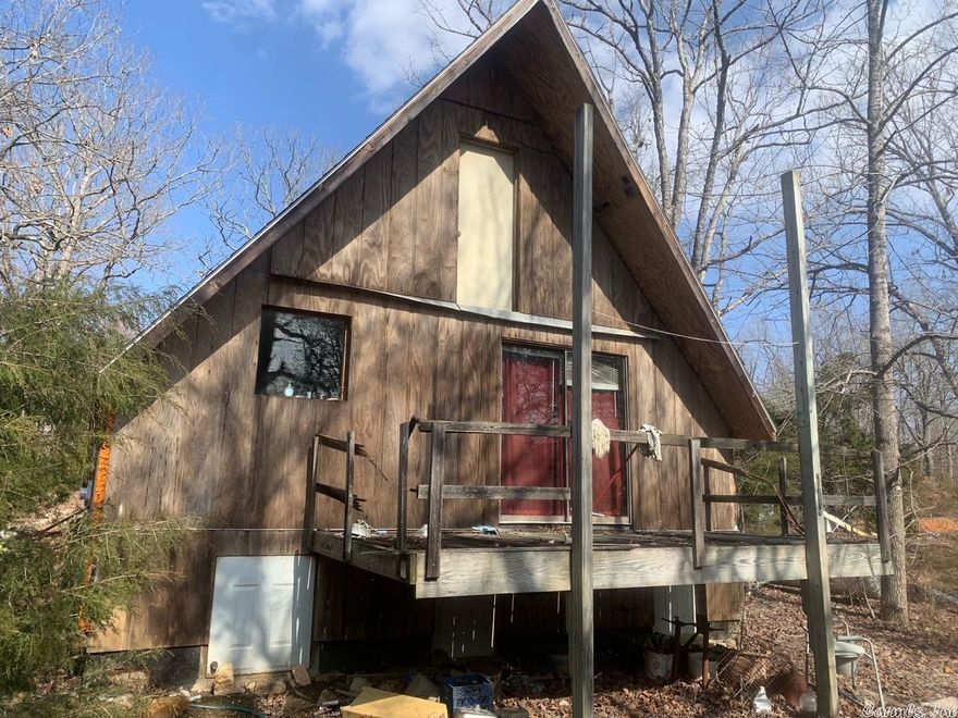 5.69 acres with A-Frame cabin, central Heat and Air, well water, septic, great bug out getaway, weekender or to live in. Deer, turkey, squirrels, and Spring River in Old Hardy Town just minutes away. Harold Alexander Wildlife Conservation District close by.