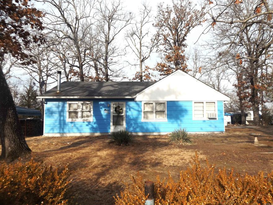 Cute 3/2 1200 Sq Ft Lake home. Shop with Electric. Nice Lake View, Carports for Cars and Boat! Whole House Instant Hot Water Heater. Hard Wired Video Security System. Perfect for Young Couples and Retirees! $149,900