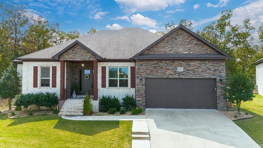 Lovely craftsman style nestled atop of the ridge at the end of cul-de-sac overlooking the neighborhood. This 3bd/2b home delivers so many charming custom features from the ceramic wood style flooring, stylized backyard fencing, additional concrete patio for the hot tub (conveys with home), wooden deck, above and beneath lighting for the bathroom and kitchen countertops, cedar accented primary bedroom ceiling and fireplace mantle, beech wood cabinetry, and granite countertops. Come see this Greystone stunner for yourself!