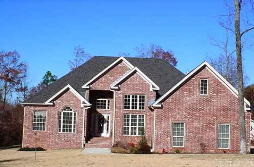 BEAUTIFUL ALL BRICK ONE OWNER HOME*BEAUTIFUL BRICK STEPS TO WELCOME GUESTS*SPACIOUS OPEN FOYER, FORMAL DINING,  LIVING AREA, KITCHEN SOARING 14 FT CEILING*HARDWOODS*MASTER SUITE HAS SITTING ROOM, MASTER BATH HAS LARGE CLOSET, SEP SHOWER, JETTED TUB, BUILT IN MED CABINETS*KITCHEN HAS SOLID STONE COUNTERS WITH EXTRA BUILT IN CABINET IN BREAKFAST AREA*ALSO SOME GLASS CABINETS*WONDERFUL BACK PORCH OVERLOOKING THE BEAUTIFUL YARD WITH NICE SHOP*OVERSIZED GARAGE WITH AN EXTRA WIDE CONCRETE DRIVEWAY