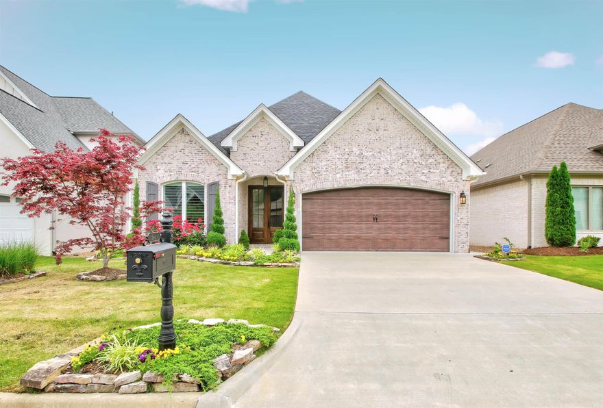 Gorgeous 1.5 story in Chenal's coveted Wildwood Place with the primary & one other br down and the third up; Chef's kitchen open to living area with breakfast bar, stainless appliances, double ovens, 6 burner gas range, walk-in pantry, pot filler, pull out spice racks, farm sink, built-in microwave, & fridge that conveys; Quartzite counter tops throughout entire house & luxury vinyl and/or ceramic tile flooring throughout entire house except for guest bedroom; Generous living area has gas log fireplace & double French doors to screened in back porch; Formal dining room, separate laundry room, tankless hot water, floored walk out attic space, & tall ceilings as high as 14'; Luxurious primary suite with trey ceiling & large walk-in closet with built ins & counter top space; Primary bath has soaking tub with overhead chandelier, glass walk-in shower with wall jets, & double vanities; German schmear brick exterior, screened in back porch, uncovered patio, covered front entryway, fully wood fenced flat lot/yard with extensive landscaping, sprinkler system, & French drains; Zoned for Chenal Elementary School & has neighborhood pool, park, playground, walking trail, & activities.