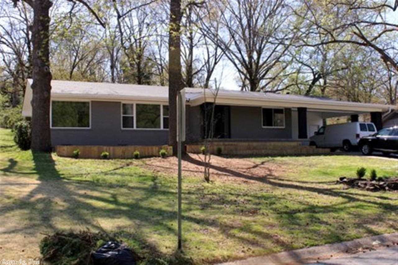 SPECTACULAR LAKE VIEW IN THIS TOTALLY REMODELED HOME. This property features 3 bedroom, 3 baths (each bedroom has a private bath) and is totally updated inside and out. New kitchen, new baths, refinished hardwood floors, new paint, new lighting. Updated electrical,plumbing and new vinyl windows. Exterior has a new roof, new siding and a new deck to enjoy the beautiful lake view. Too many updates to list