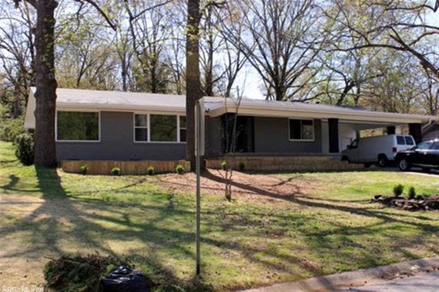 SPECTACULAR LAKE VIEW IN THIS TOTALLY REMODELED HOME.  This property features 3 bedroom, 3 baths (each bedroom has a private bath) and is totally updated inside and out.  New kitchen, new baths, refinished hardwood floors, new paint, new lighting. Updated electrical,plumbing and new vinyl windows.  Exterior has a new roof, new siding and a new deck to enjoy the beautiful lake view.  Too many updates to list