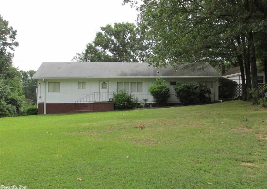 Very well maintained older doublewide*** Conveniently located *** 3 BR *** Nice large lot *** Shop ***