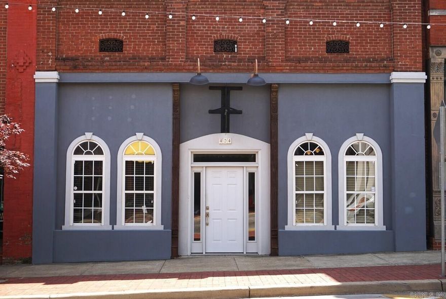 Located in the heart of downtown Jonesboro, this 2,300 sq ft office building offers a cool, professional space perfect for a growing business. It features four private offices, a welcoming lobby, a breakroom, and three bathrooms—ideal for comfort and productivity. With great visibility and access to the energy of Main Street, it’s a solid spot to plant your business in a vibrant part of the city.
