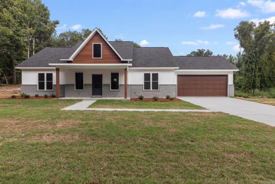 Welcome to your dream home! Nestled on over an acre, this 3 bed, 2 bath house combines elegance, functionality, and breathtaking design. As you step inside, you'll immediately notice the impressive high vaulted ceilings, creating an open and airy atmosphere. The heart of this home is the modern kitchen, featuring exquisite quartz countertops and a walk-in pantry for all your storage needs.  The master bedroom and bathroom feature a spacious walk-in closet, porcelain shower and a modern tub, perfect for relaxing. LED lighting throughout the house adds a touch of sophistication and sets the perfect ambiance for any occasion. Outside you'll find the patio with a fireplace, creating an inviting atmosphere for outdoor entertaining and relaxing evenings. With plenty of space, this property offers endless possibilities for creating memorable moments with loved ones. Don't miss the opportunity to see the impeccable craftsmanship and thoughtful design firsthand. Schedule a tour today and let this house become your dream home!