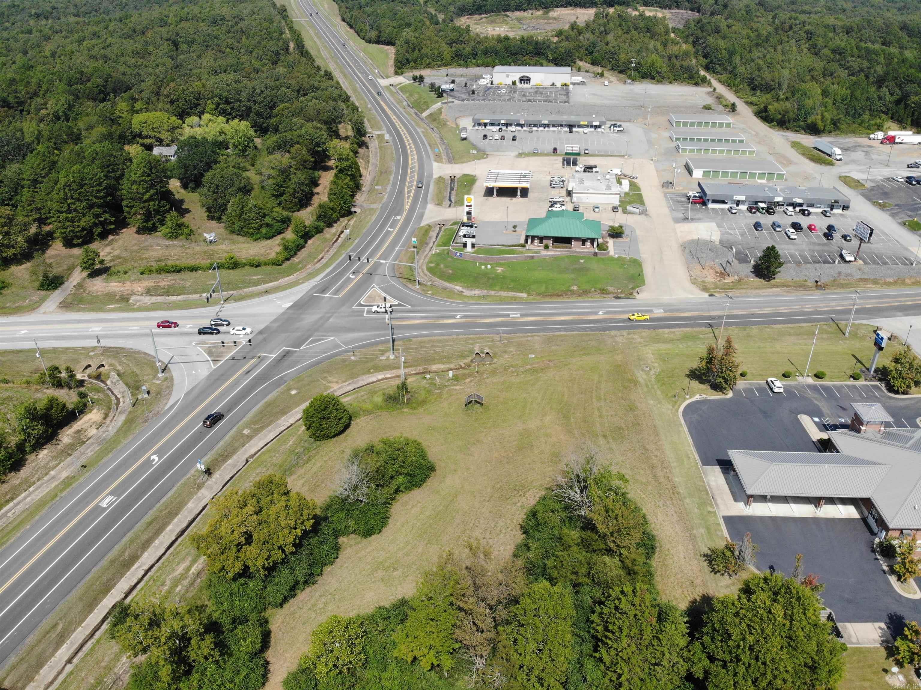 Commercial property for sale in best location in Cleburne County. At the traffic light on the corner of Hwy 110 and Bypass Road. All utilities available. Shopping and dining on site. Within 1/2 half mile of Little Red River, Greers Ferry Lake, ASU Campus and Baptist Hospital.