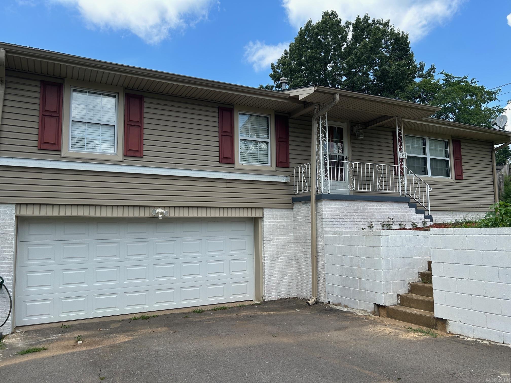 Large lot and lots of storage with this 1440 square foot 3 bedrooms 1.5 bath home. New kitchen cabinets, countertops, dishwasher and some new flooring. Original hardwood flooring. Large new deck on back of the house. Refrigerator & washer also convey.