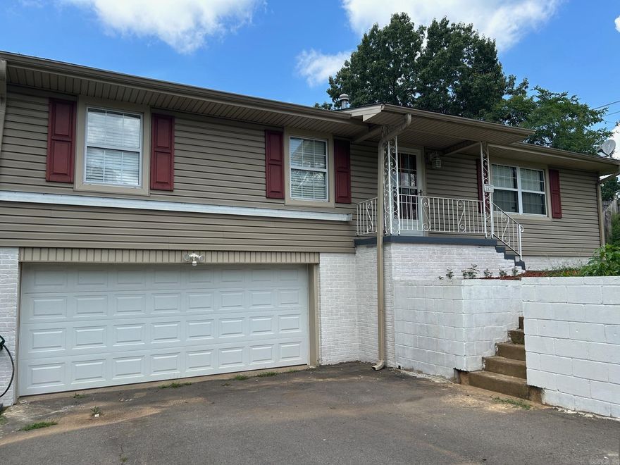 Being sold "as is" Large lot and lots of storage with this 1440 square foot 3 bedrooms 1.5 bath home. Original hardwood flooring. Large new deck on back of the house. New garage door. Additional 600 sq ft in the basement that is heated and cooled. Refrigerator & washer also convey.