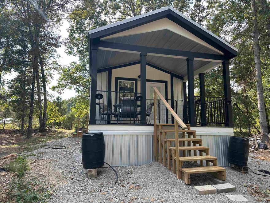 Escape to the country with this adorable new tiny home on 10 unrestricted acres m/l! This property is fully set up with brand-new appliances, a private well, RV hookups, fencing, pond and even a generator—making it the perfect turn-key retreat. The home is built with metal roof and walls for durability and low maintenance, and everything stays so you can move right in. Whether you’re looking for a VRBO rental, hunting camp, summer getaway, or a full-time country escape, this property checks all the boxes. With ample room for hunting on your own land and the infamous White River nearby for world-class trout fishing, the possibilities are endless. Don’t miss your chance to own this rare find—luxury living in the country with endless potential! This one won’t last long!