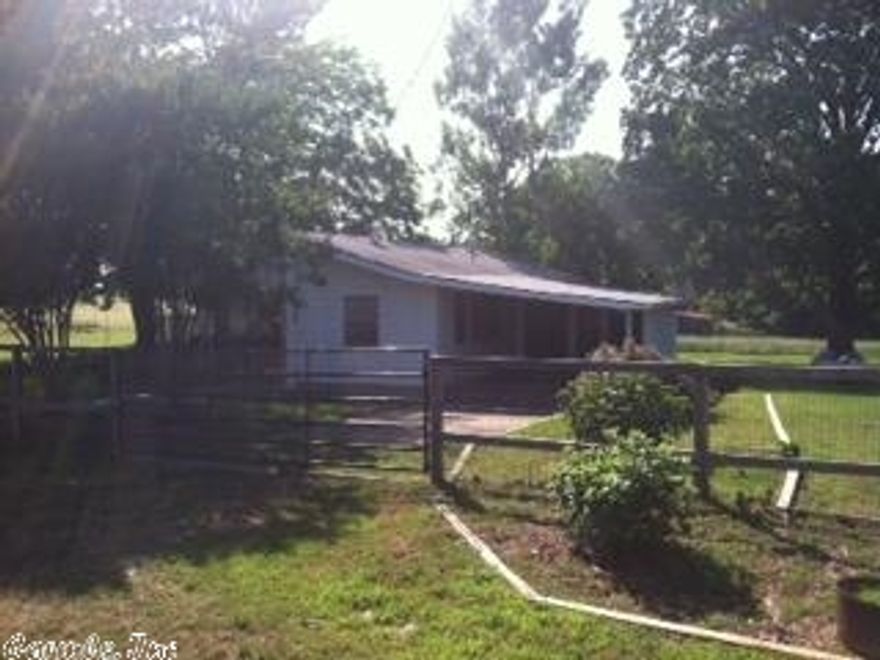 Cute and clean 3 bedroom 2 bath home sitting on 1.5 cleared acres.. Beautiful country setting and move in ready with fresh paint inside and out, updated bathroom and beautiful hardwood floors. Property is fenced  and has an excellent garden spot..Ouachita river is only 2 miles up the road. Perfect little get away or place to raise the kids or retire...Tons of options!