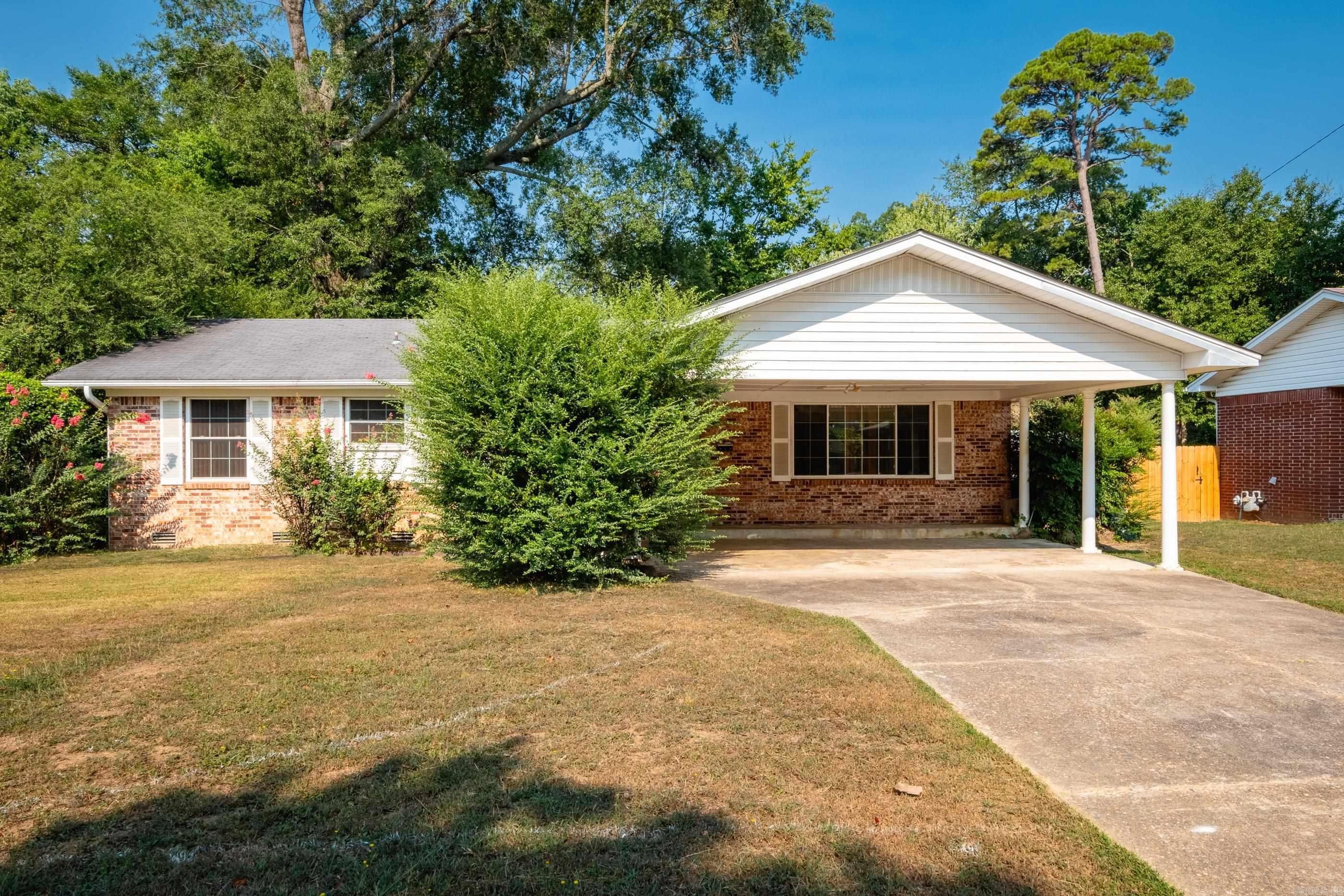 One level brick home with original hardwood floors. Great investment opportunity being sold "as-is".