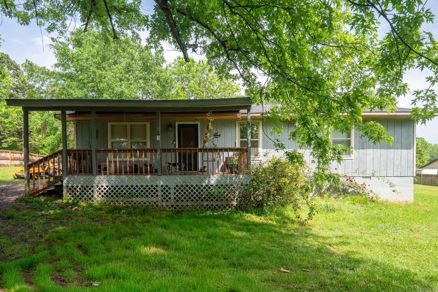 Private country living on nearly 1.5 acres in Conway! This 3 bed, 2 bath home offers a split, open floor plan with plenty of space to relax and unwind. Enjoy the peaceful setting from the covered front deck or entertain on the back deck overlooking your fully fenced yard with a large wood privacy fence. Major updates already done for peace of mind: roof replaced in 2022, HVAC updated in 2018, and full home revamp in 2018. Kitchen appliances include a newer dishwasher and a stove just 2 years old. Tucked away for privacy!! schedule your showing today! Storage building does not convey