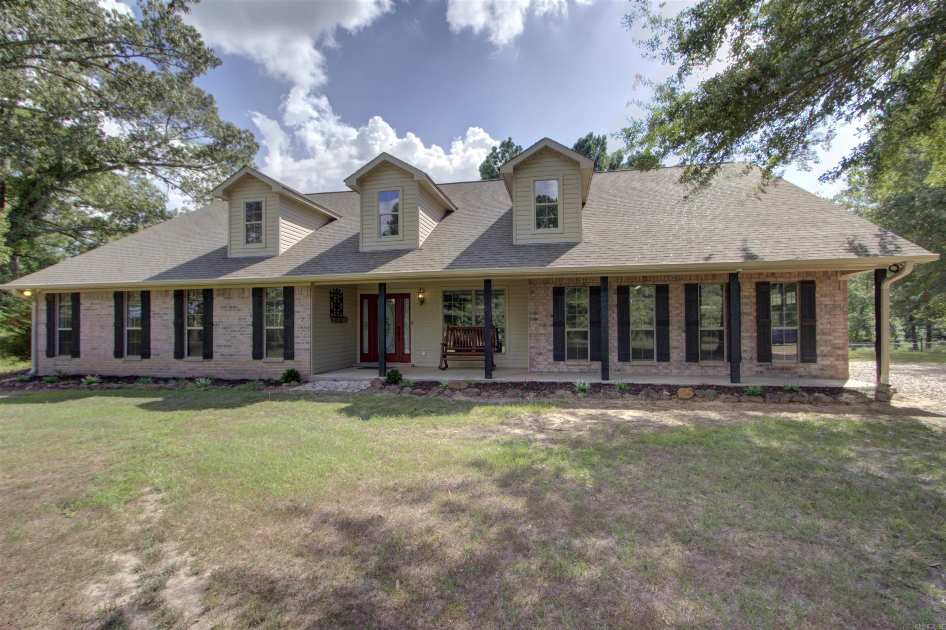 Luxury Living Meets Country Charm in Genoa School District. Discover this rare gem in an exclusive rural neighborhoodāwhere luxury, space, and functionality converge on just over 14 pristine acres. Boasting soaring 18-foot ceilings, this elegant 4-bedroom, 2-bathroom home offers an open-concept design that effortlessly blends the kitchen, dining, and living areas, creating an inviting space for everyday living and entertaining. Enjoy peaceful mornings in the expansive sunroom, unwind on the large patio, or get to work in the impressive shop, complete with two overhead doors and horse stallsāideal for equestrian lovers or hobbyists alike. A spacious two-car garage adds to the convenience. Located in the highly regarded Genoa Central School District, this home provides access to one of the area's top-performing public school systems, known for strong academic standards, a supportive community, and a robust athletic program. Genoa students compete in football, basketball, baseball, softball, track & field, and moreādeveloping both character and competitive spirit. This is more than a home,itās a lifestyle. Privacy, acreage, amenities, and schools-best of the best all round.