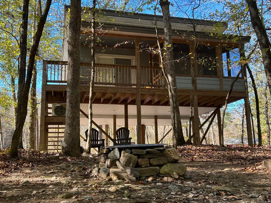 NOW ACCEPTING PRE-AUCTION OFFERS - ATTENTION INVESTORS: Blackmon Auctions & Thomas Blackmon Realty will be auctioning Pam’s Tree Cabins in beautiful Hot Springs, AR on Friday, February 7th at 10:00am.  Don’t miss this tremendous opportunity to bid on this great investment! Located minutes away from Lake Catherine State Park, the Ouachita River, Diamondhead Country Club, Lake Hamilton, and all the amenities of Hot Springs.   Includes three newer, meticulously maintained tree cabins that are generating a healthy income as Airbnb rentals. This is a turn-key sale that includes all furniture and appliances.  Each unit is a cozy one bedroom, one bath, elevated tree cabin resting quietly on the banks of Cooper Creek, sitting on 3± acres. The current structures are situated on approximately half of the 3± acres leaving room for future cabins, RV pads, etc. and additional income potential. Properties like this don’t come up for sale often!  Contact agent for past rental history.  Cabin#1: 384sqft, Cabin#2: 480sqft, Cabin#3: 408sqft
