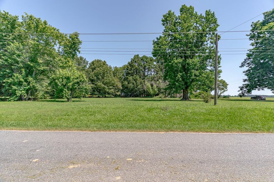 Welcome to Market 6634 Hamilton Loop in Carlisle, AR! Unrestricted and ready for your vision, this 1+\- acre corner lot in Carlisle offers the perfect setup for building your dream home, workshop, or investment property. The property features a spacious 600 sf shop with electricity and a concrete pad already in place, saving you time and money on setup. The lot is mostly cleared with a few mature shade trees, providing a balance of open space and natural beauty. Located in a peaceful rural setting with no zoning restrictions, this land offers endless possibilities for use. Whether you’re looking to build, store equipment, or simply invest in a piece of quiet countryside, this property has the flexibility and infrastructure to make it happen. Call your favorite agent to show today!